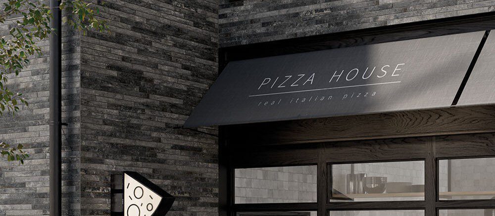 Außenwand eines Restaurants mit Vintage-Kleinformatfliesen in Steinoptik, Grau-Schwarz-Anthrazit, für elegante Kontraste.